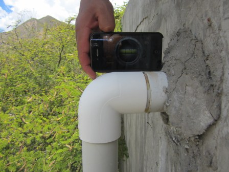Measuring slope of a pipe with an iPhone app. Engineers-In-Action!