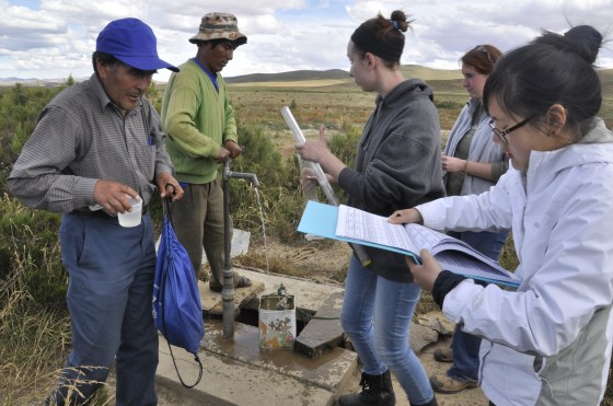 A municipal technician Maclovio, community water committee president Nasario, and G.Tech researchers.